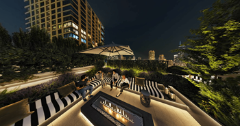 a rendering of the rooftop terrace at night with people sitting on it at Chateau on Wells, Chicago, IL